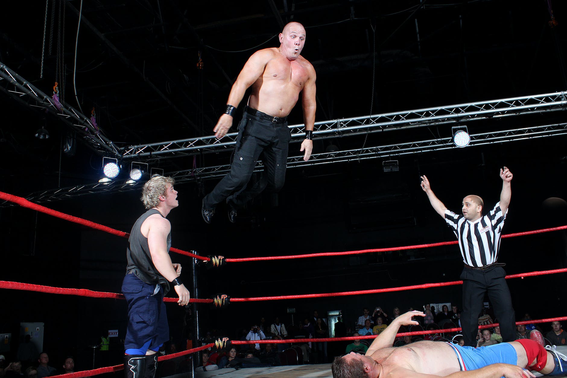photography of man jumping on ring